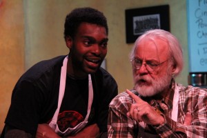 Sesugh Solomon Tor-Agbidye as Franco Wicks and Charlie Ferrie as Arthur Przybyszewski in OpenStage Theatre’s production of Superior Donuts by Tracy Letts. Photo by Joe Hovorka
